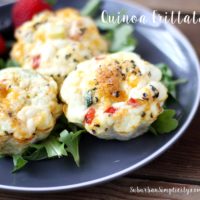 Mini Quinoa Frittatas on a grau plate with mixed greens.