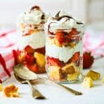 Strawberries, pound cake, and whipped cream in a jar for dessert.