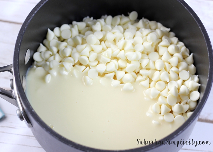 whit chocolate chips and condensed milk in a Pan