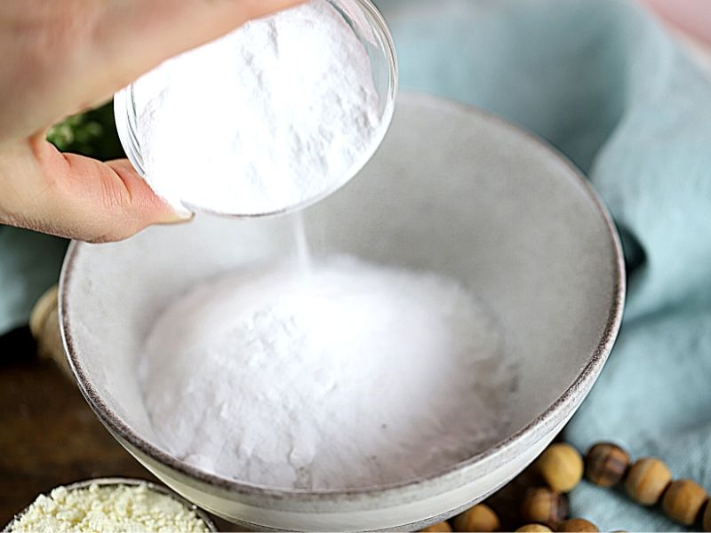 Ingredients for foot soak being added to bowl