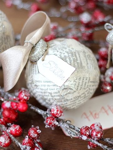 Making your own DIY Book Page Ornament is simple and fun. Use an old book to create a one-of-a-kind Christmas decoration your family will cherish year after year.