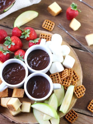 This Chocolate Caramel Fondue Recipe is a decadent dessert the whole family will enjoy! It's easy to make anytime!