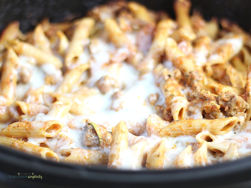 Crockpot Pizza Casserole is an easy weeknight dinner everyone LOVES! Simple and delicious every time. It's even great leftover for lunch the next day!