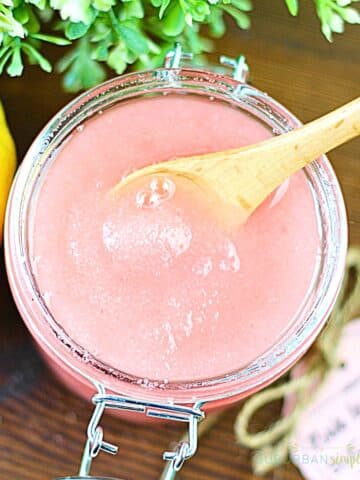 Jar of pink lemonade body scrub.