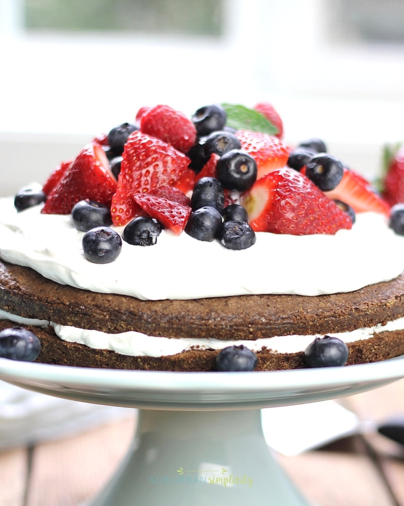 Looking for a yummy brownie recipe? Layers of fudgy chocolate brownie with a creamy center, topped with berries make this Brownie Strawberry Shortcake a winning dessert combination!