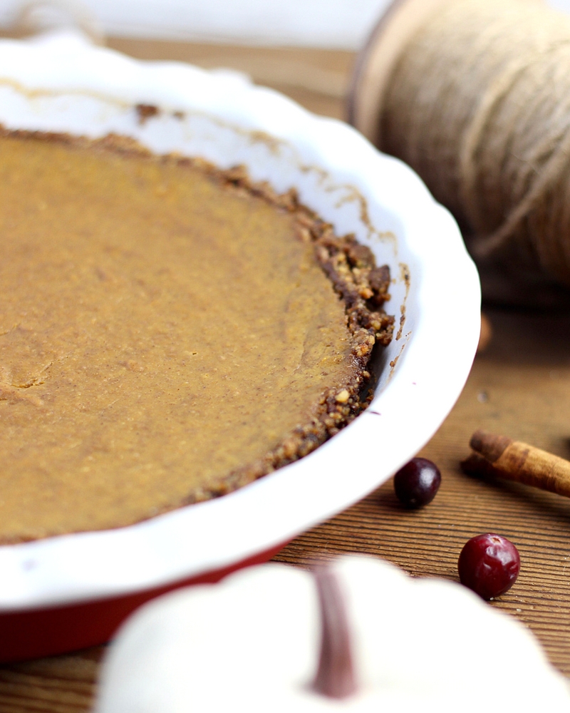 This Paleo Pumpkin Pie tastes delicious and is grain and dairy free.  This healthier Thanksgiving recipe has just the right amount of spice and a velvety filling you'll crave all season long!  #paleothanksgivingrecipe