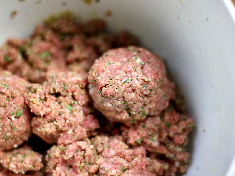 Meatball parm meatballs in a bowl.