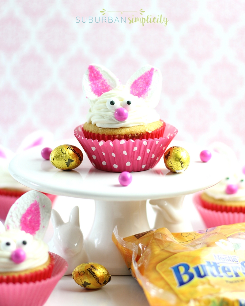 Bunny cupcakes on a cake stand with Butterfinger NestEggs around them.