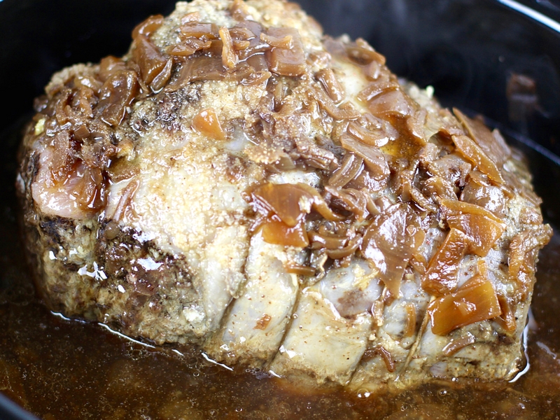 Beef just out of the crock pot for French dip sandwiches.