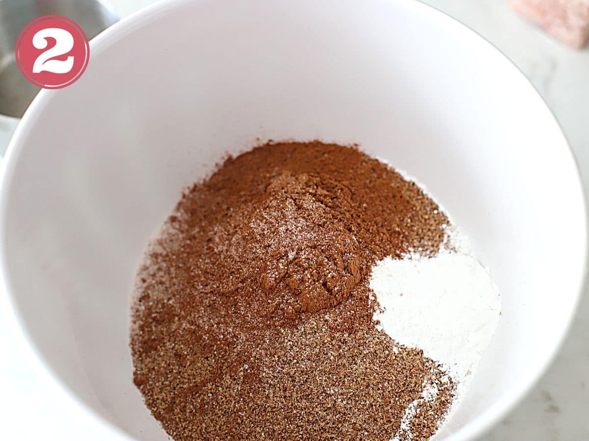 Flaxseeds, cinnamon, baking soda and baking powder in a bowl.