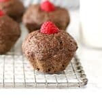 flaxseed muffin with a raspberry on top.