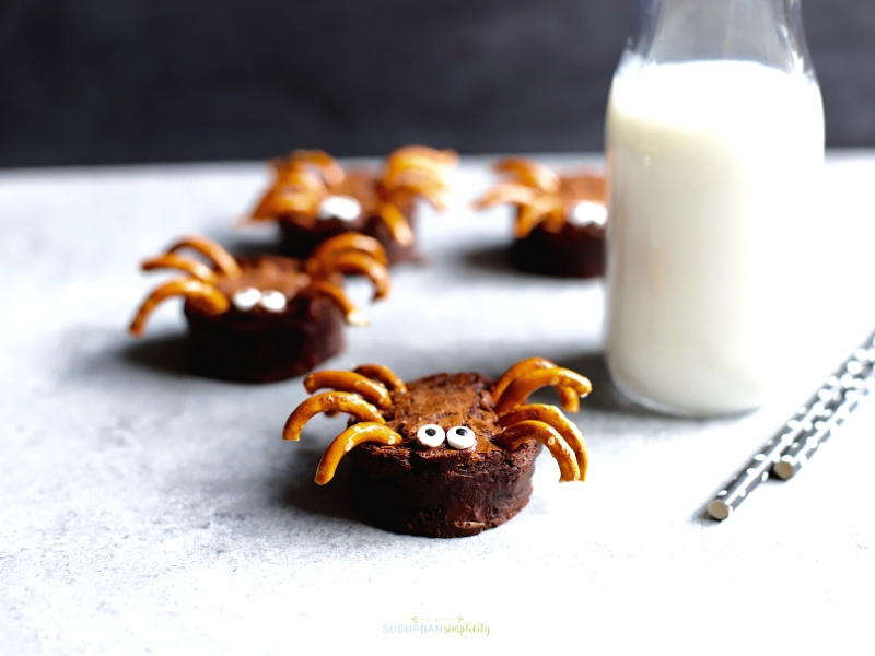 Halloween Brownie Spider with milk in the background.