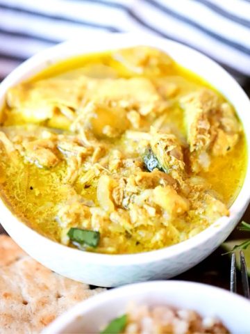 Come home to a flavorful and delicious Crock Pot Chicken Curry.  Throw all your ingredients into your slow cooker and enjoy to a spice-filled sauce that pairs perfectly with rice!