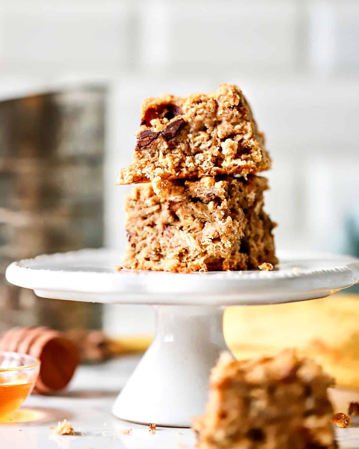 Two Oatmeal Banana Bars Stacked on a pastry stand.