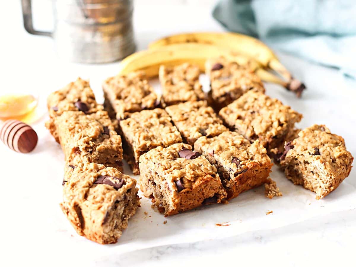 Banana oatmeal bars with chocolate cut into squares.