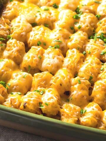 Freshly baked tater tot casserole in a casserole dish.