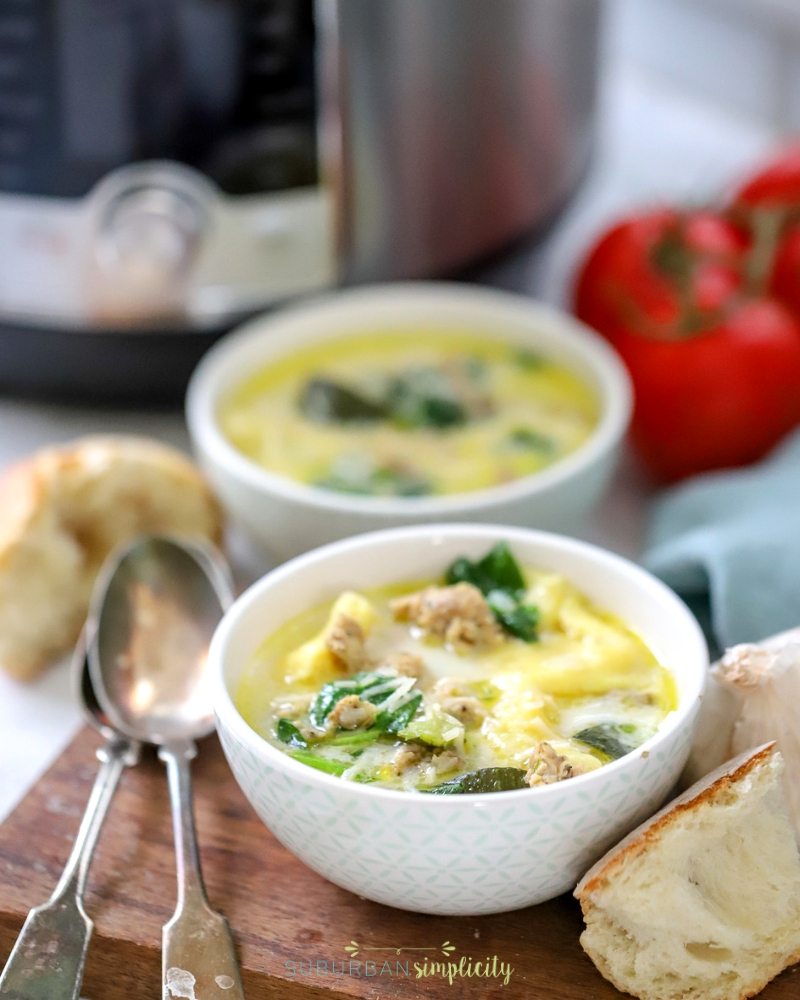 Two bowls of Instant Pot Tortellini Soup.