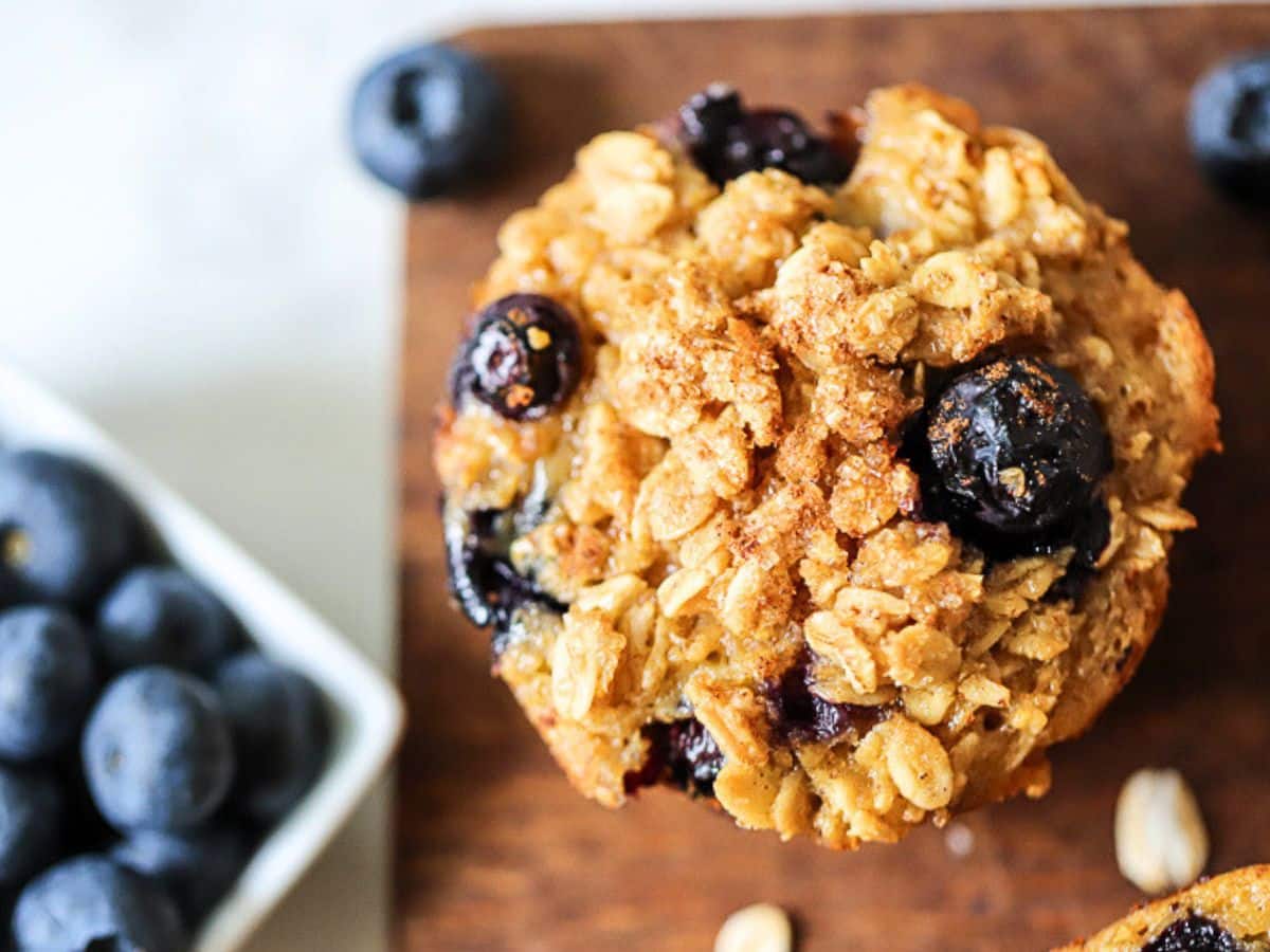 Top view of a baked oatmeal cup with fruit.