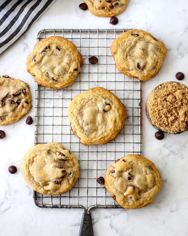 Chocolate chip cookies on a baking rack