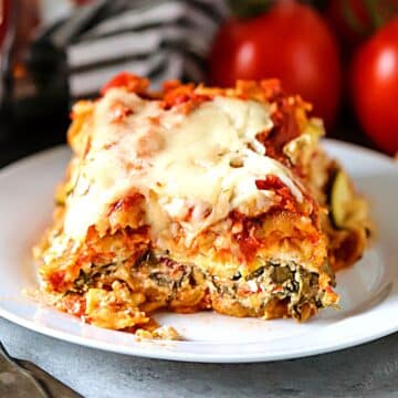 A close up of crockpot lasagna on a plate.