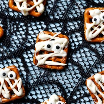 Mummy pretzels with candy eyes.