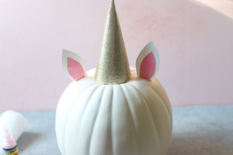 ear glued on a pumpkin