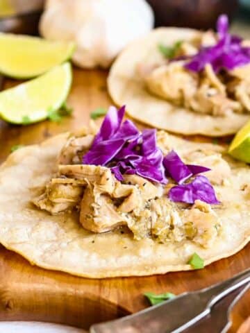 Taco with creamy salsa verde chicken filling.