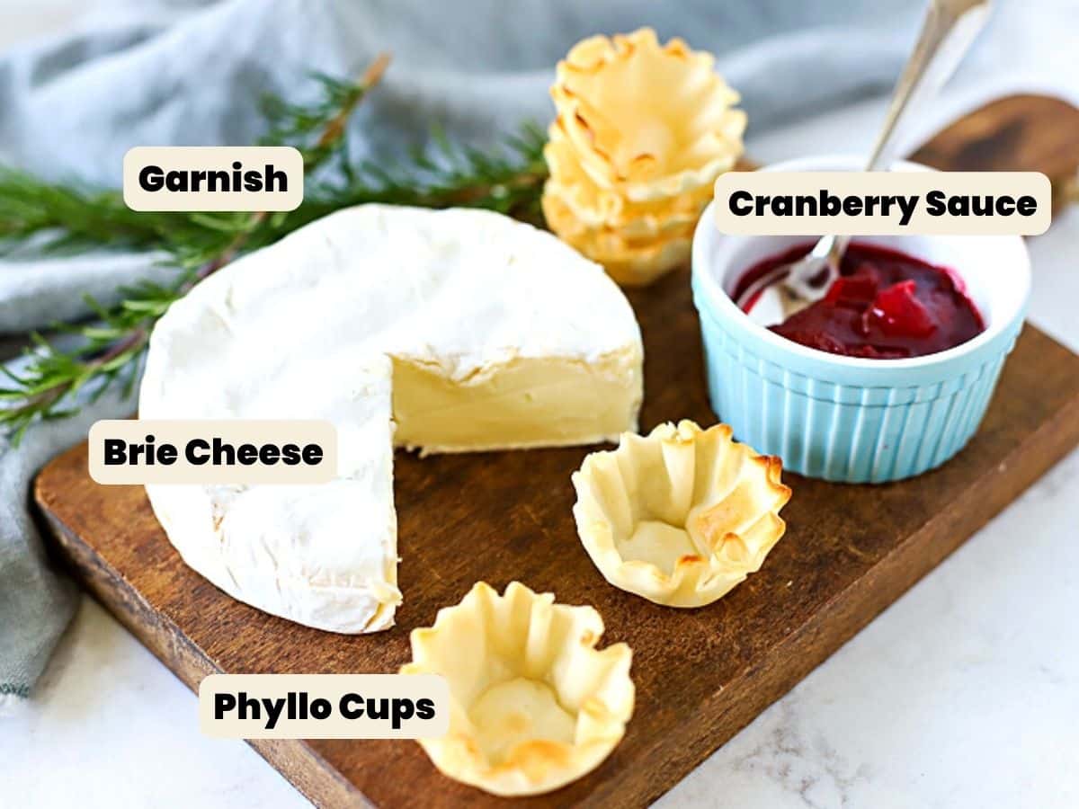 Brie cheese, phylllo cups, and cranberry sauce to make an appetizer.