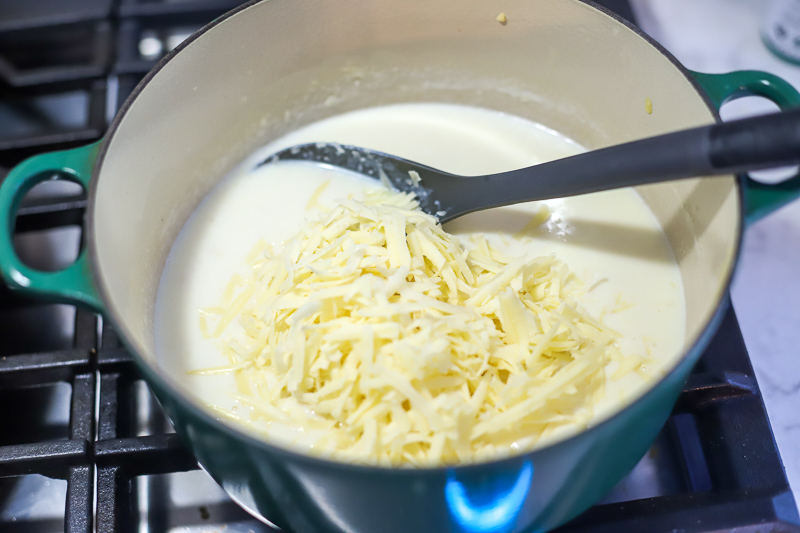 Adding cheese to sauce for mac and cheese