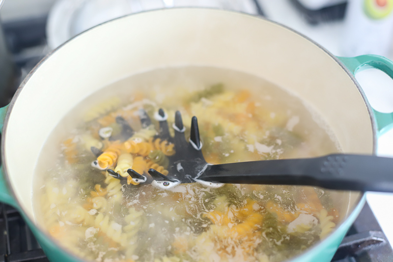 pasta in a pot to boil.