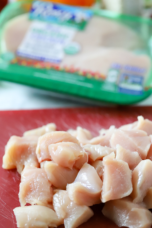 cut chicken on a cutting board