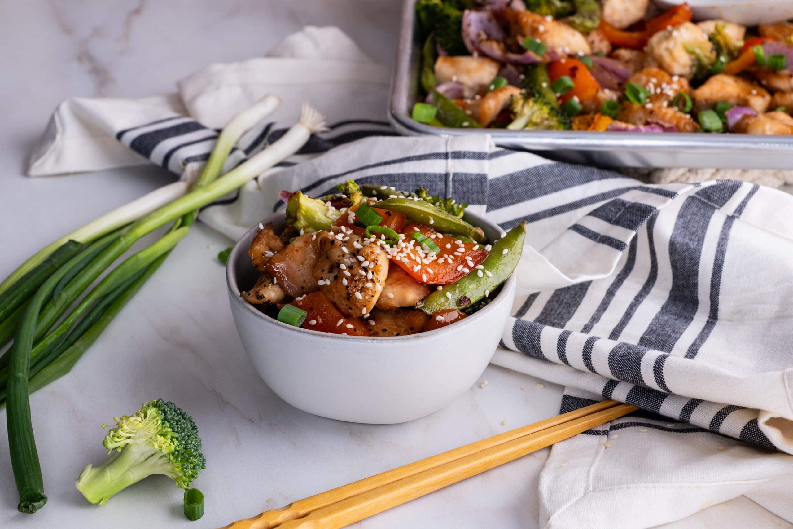 Asian sesame chicken in a bowl