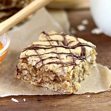 oatmeal bar with chocolate drizzled on top.