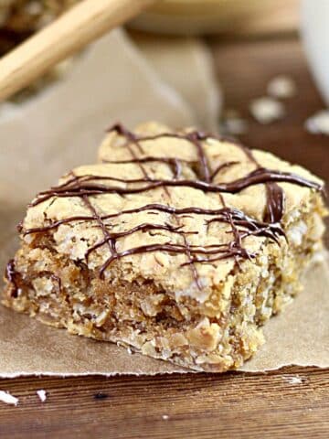 oatmeal bar with chocolate drizzled on top.