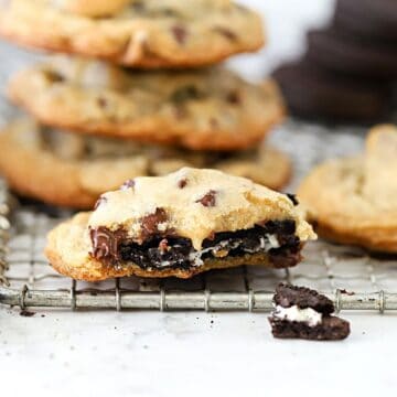 Stuffed chocolate chip cookie on a counter.