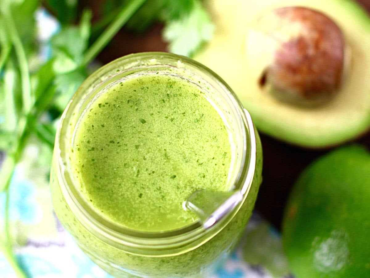 Homemade avocado dressing in a jar.