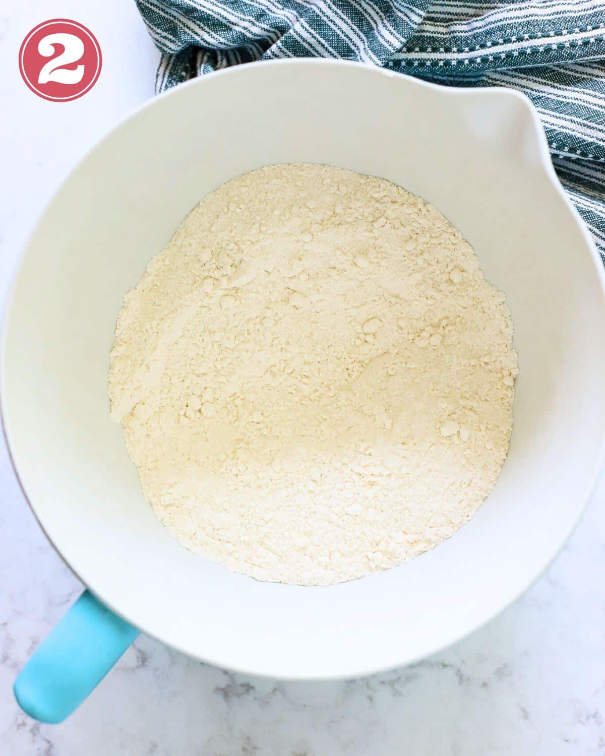 Bowl with flour, baking soda, and salt.