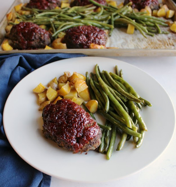 A bunch of food on a plate, with Meatloaf