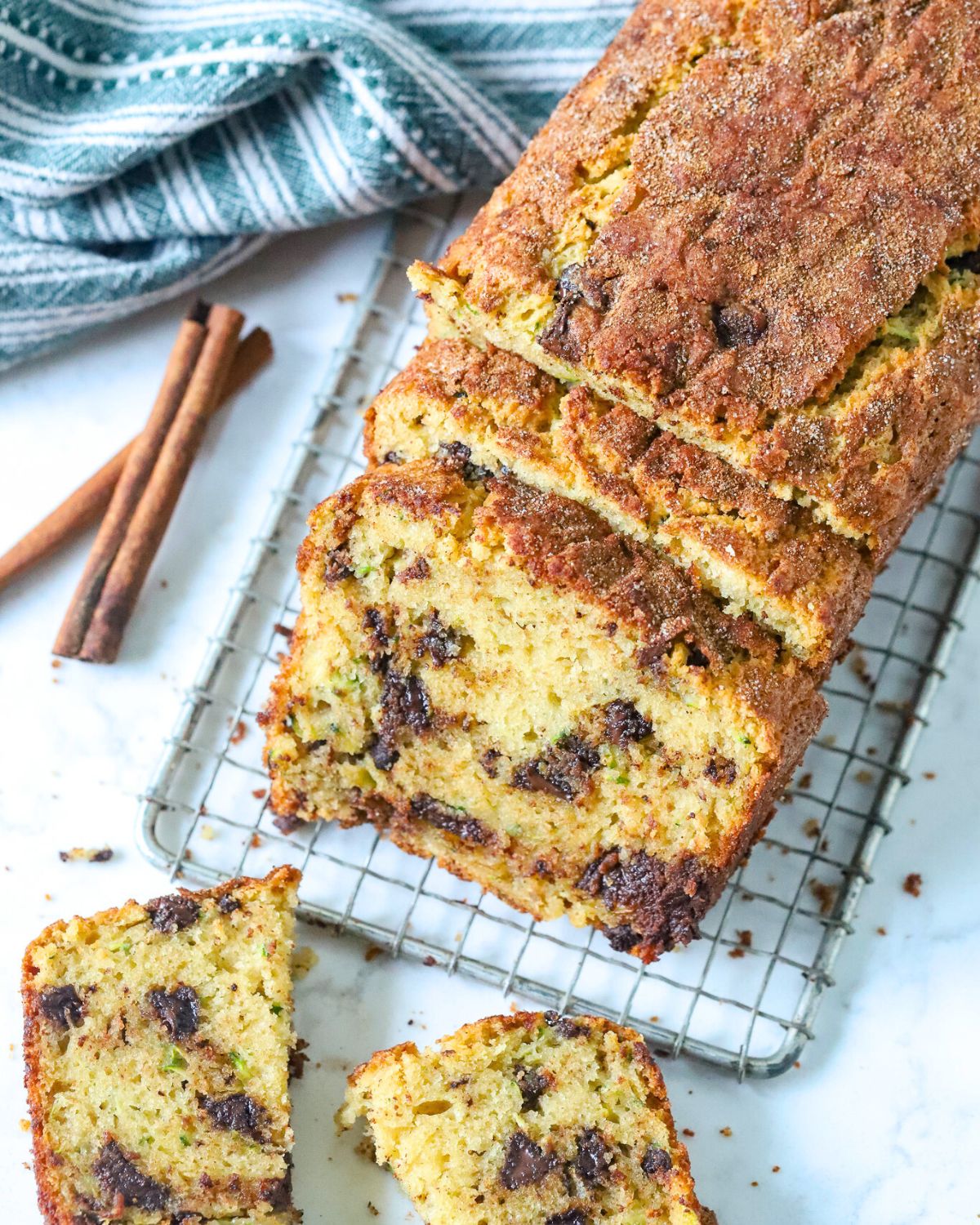 Top down views of zucchini bread cut into slices.