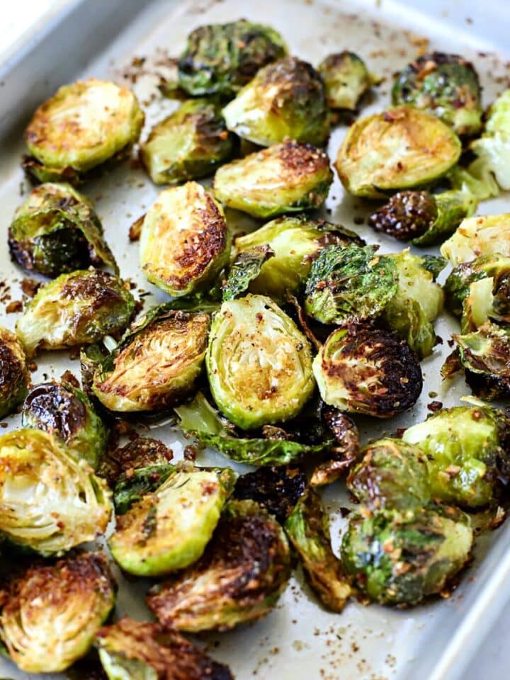 Baking sheet with Brussels sprouts that roasted.