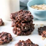 Four Chocolate peanut butter no-bake cookies stacked.