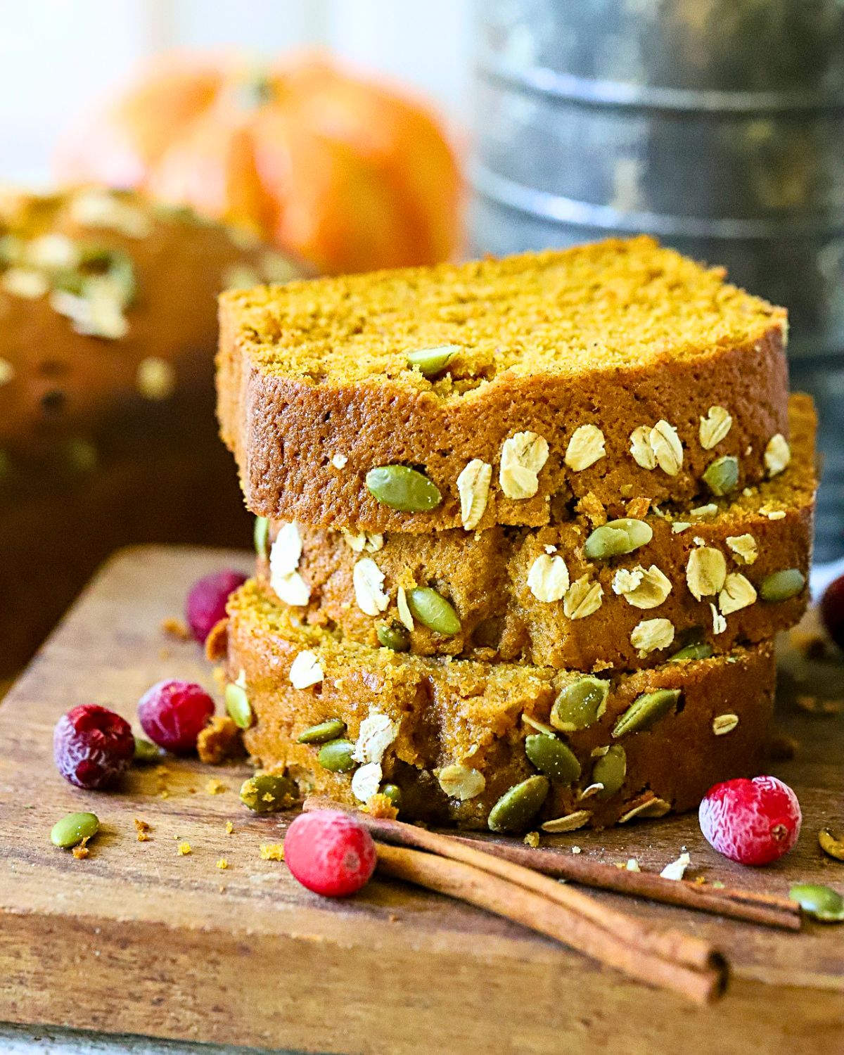 Freshly baked pumpkin bread sliced and stacked.