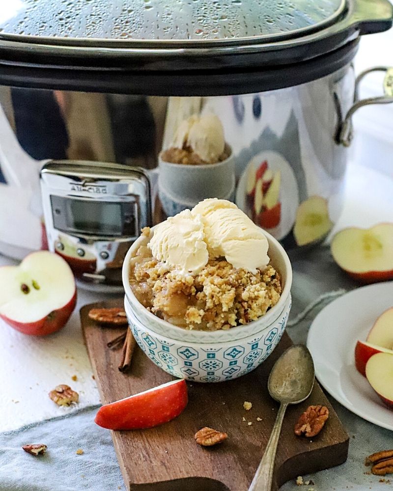 Apple dump cake in front of crockpot