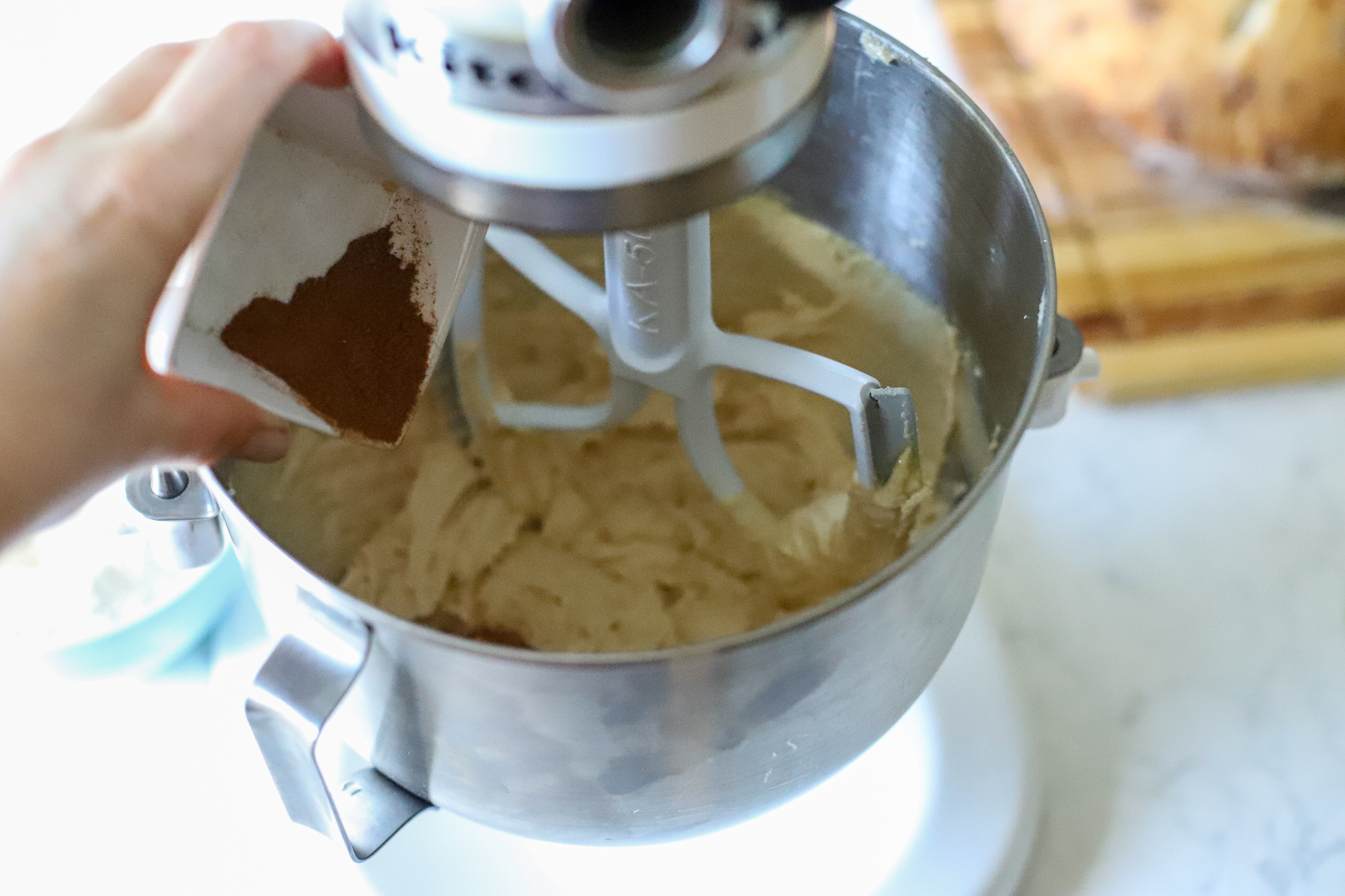 mixer with dry ingredients being added