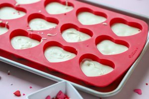 white chocolate candy in a silicone mold.