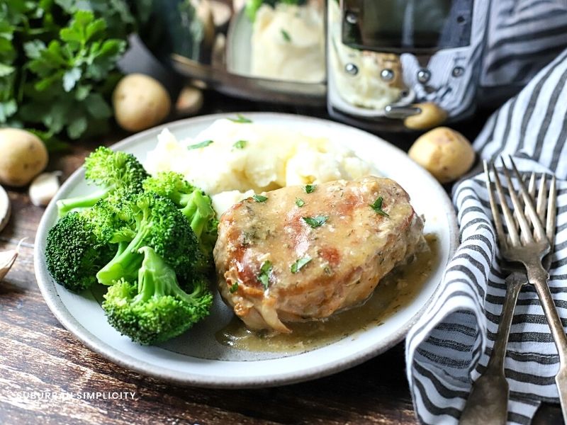 Ranch pork chop on a plate with broccoli