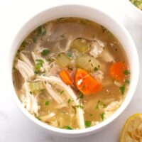 Chicken soup in a bowl that was made from scratch.