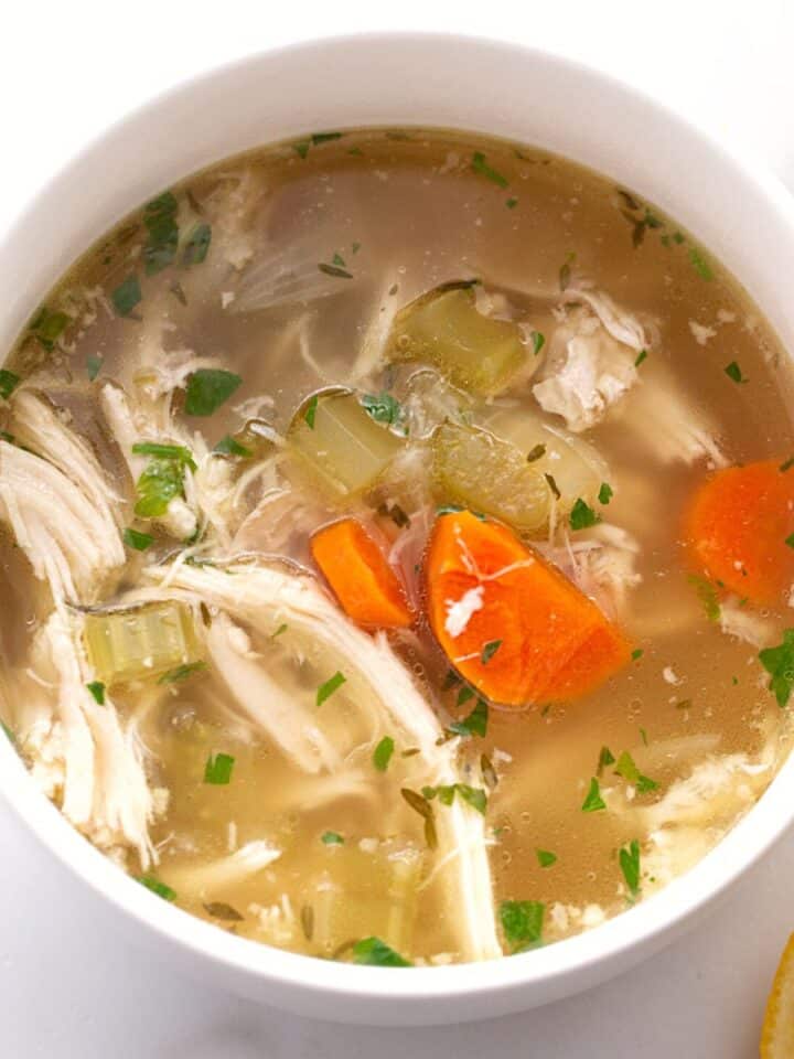 Chicken soup in a bowl that was made from scratch.