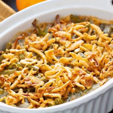 Slow cooker green bean casserole in a dish.