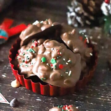 A plate full of crockpot Christmas candy.